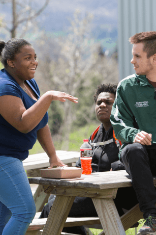 tc3 students at picnic table