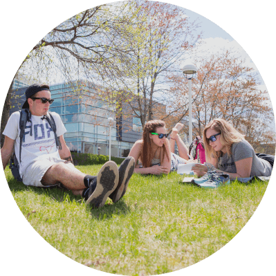 students on tc3 campus lawn