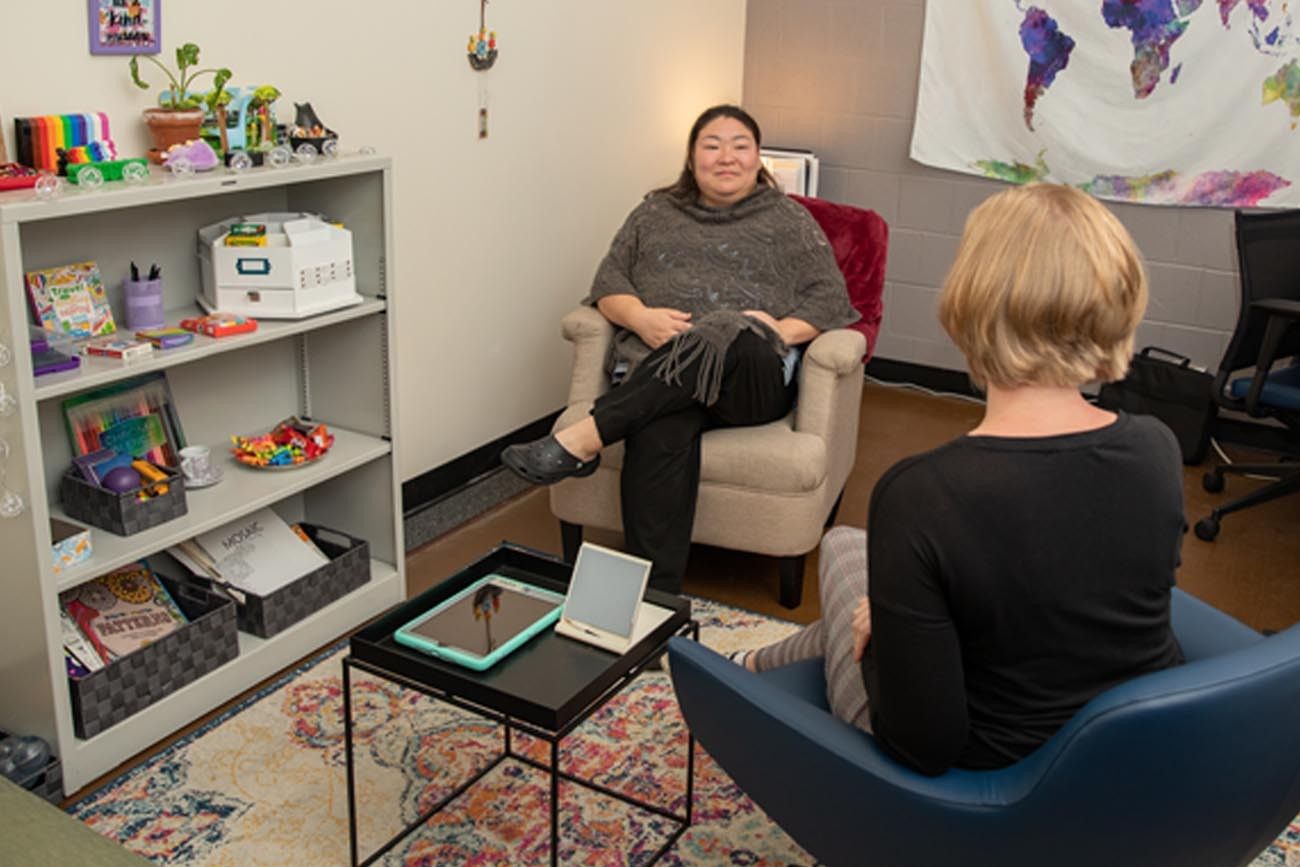 counselor sitting with patient