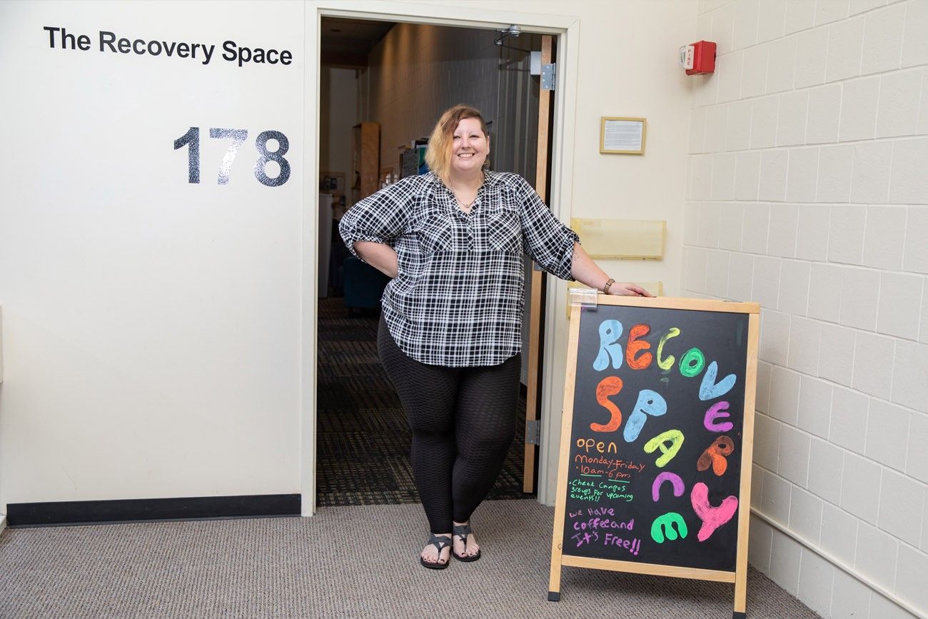 welcoming staff in front of Recovery Space