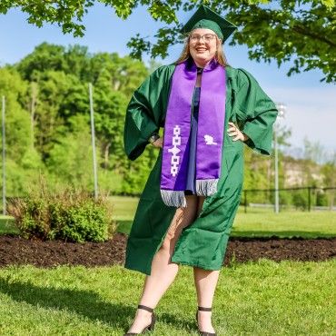 2024 CollegeNow Graduate from Homer High School in cap and gown