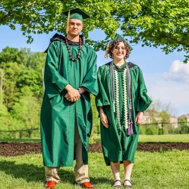 2024 CollegeNow Graduates from Newfield High School in cap and gown