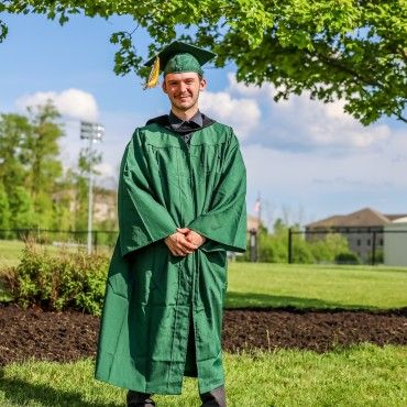 2024 CollegeNow Graduate from Trumansburg's Charles O. Dickerson High School in cap and gown